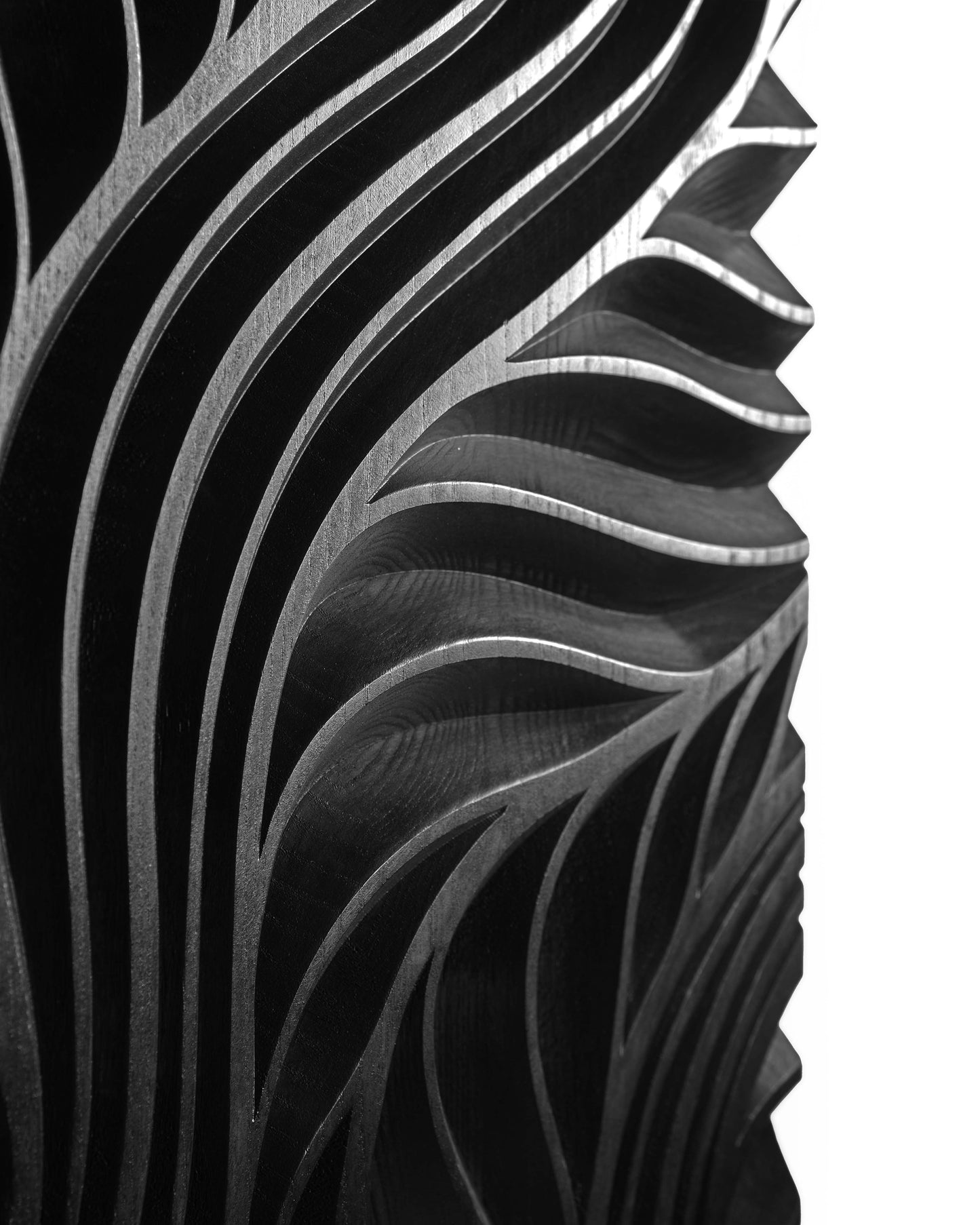 Close up of Flow black carving, edge detail and relief depth