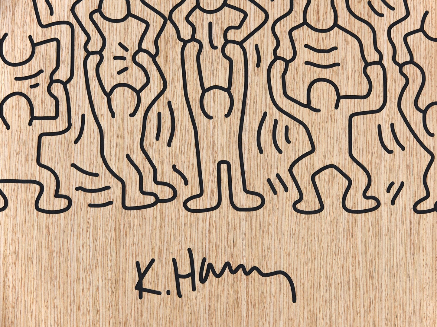 Close up of the crowd panel with signature detail carved on oak