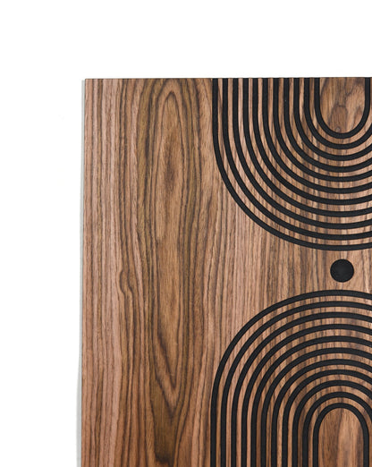Detail crop of walnut grain with arc relief and central dot, geometric composition