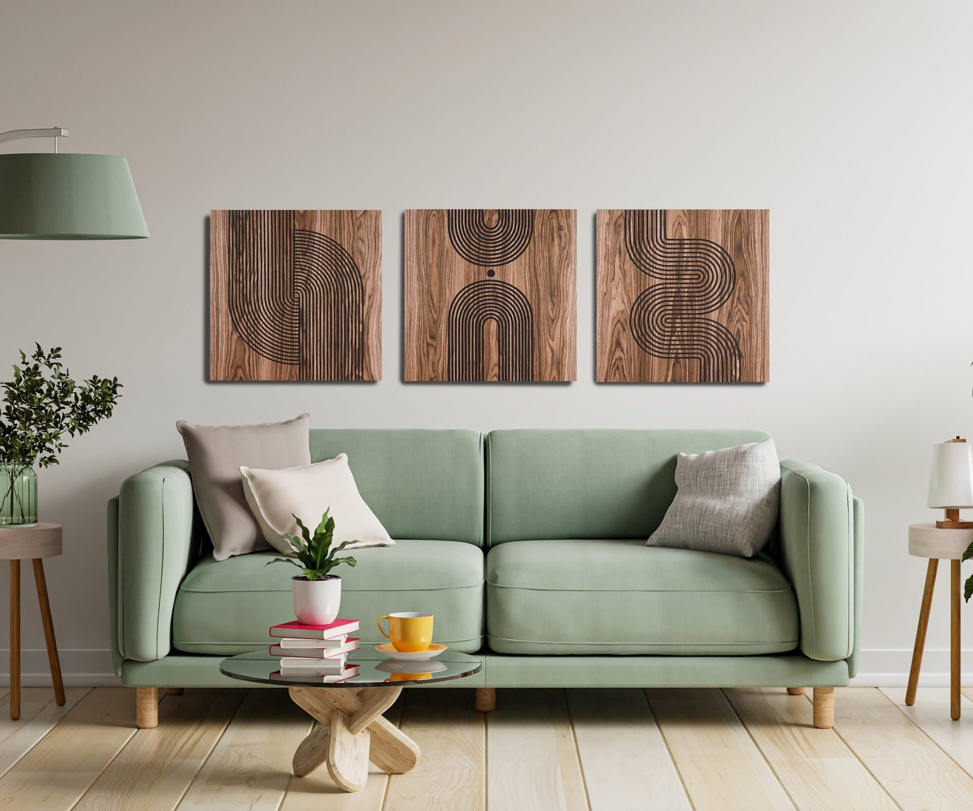 Arc Suite Walnut triptych of three walnut panels with black inlay installed above a green sofa