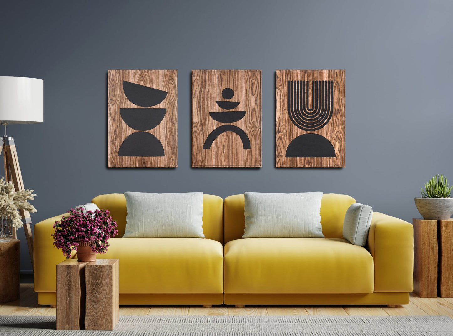 Three panel Arc Suite Walnut triptych with black inlay installed above a yellow sofa