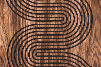 Macro detail of the S curve line pattern in black inlay on walnut