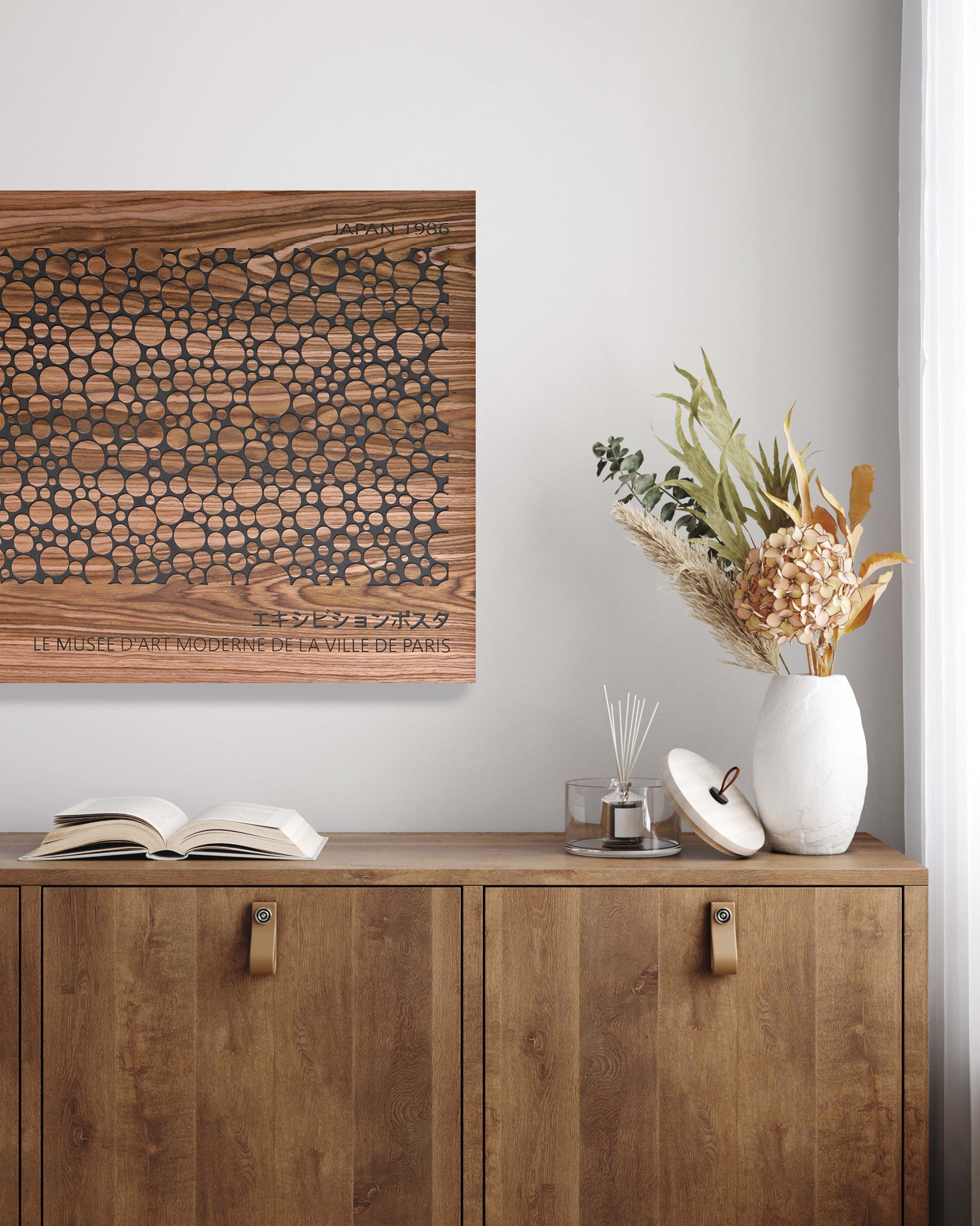 Bubble walnut and black wall panel above sideboard, interior styling
