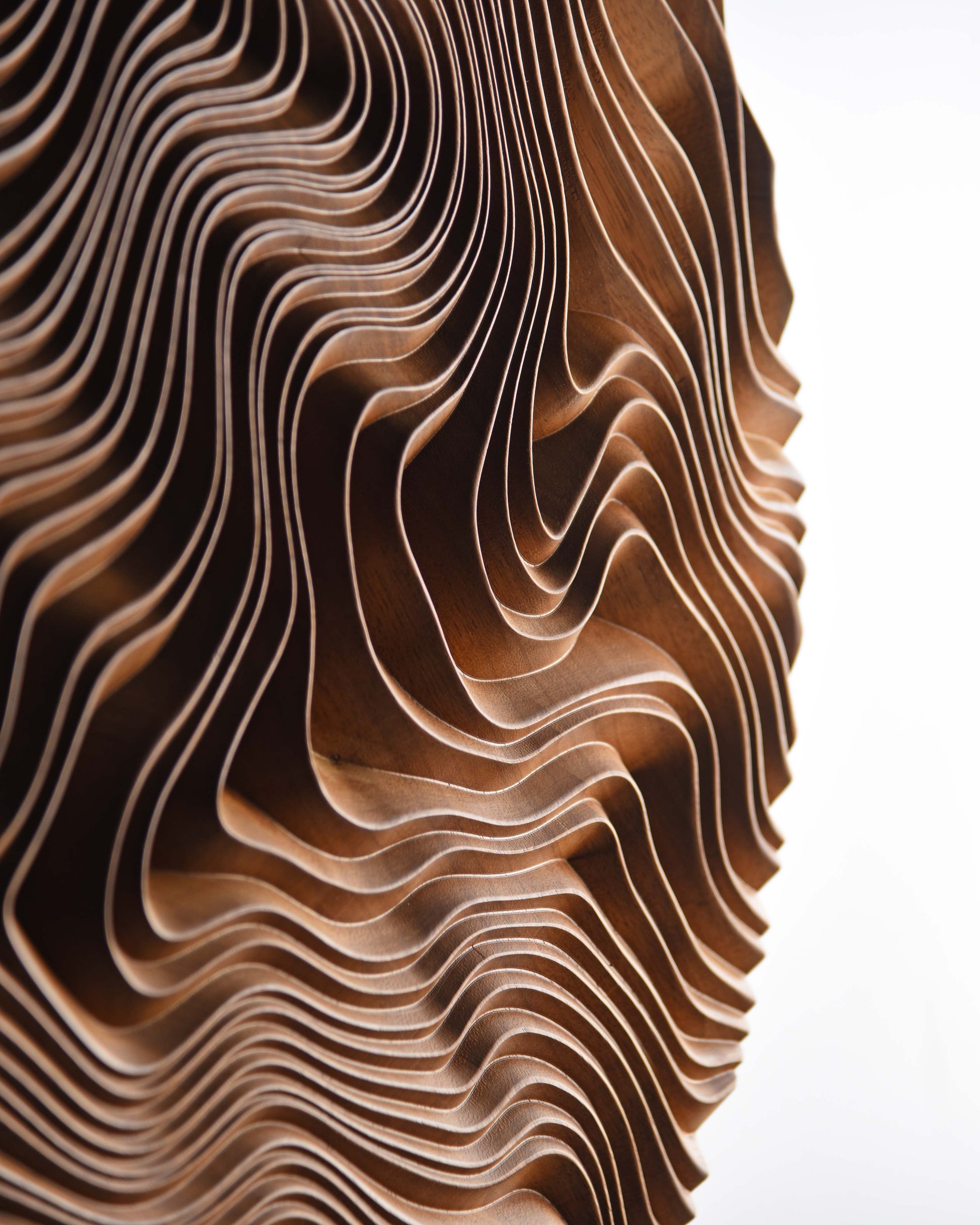 Tactile grooves capturing shadow play along the canyon motif, linking big wall decor ambitions to a subtle scandi interior setup.