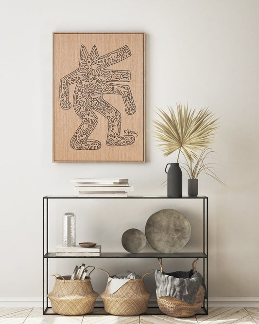 Crocodile Keith Haring carved oak wall art with black line work, styled above a console table