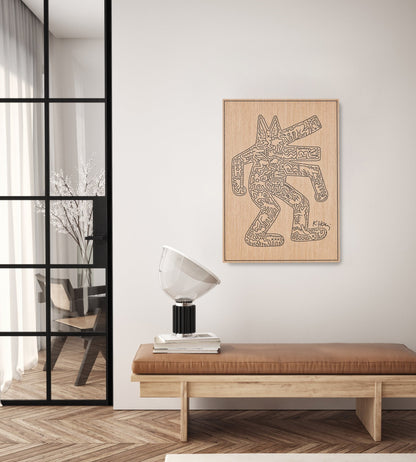 Crocodile Keith Haring carved oak wall artwork styled above a bench in a modern interior