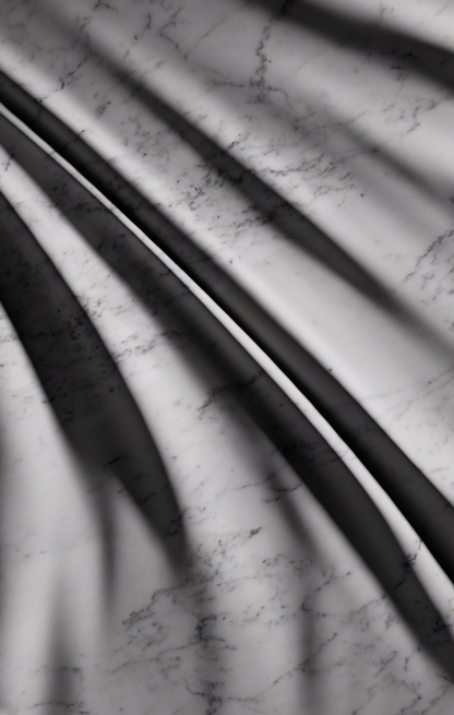 Detail of Carrara marble sculpture showing sharp fold ridges and soft transitions in light and shadow