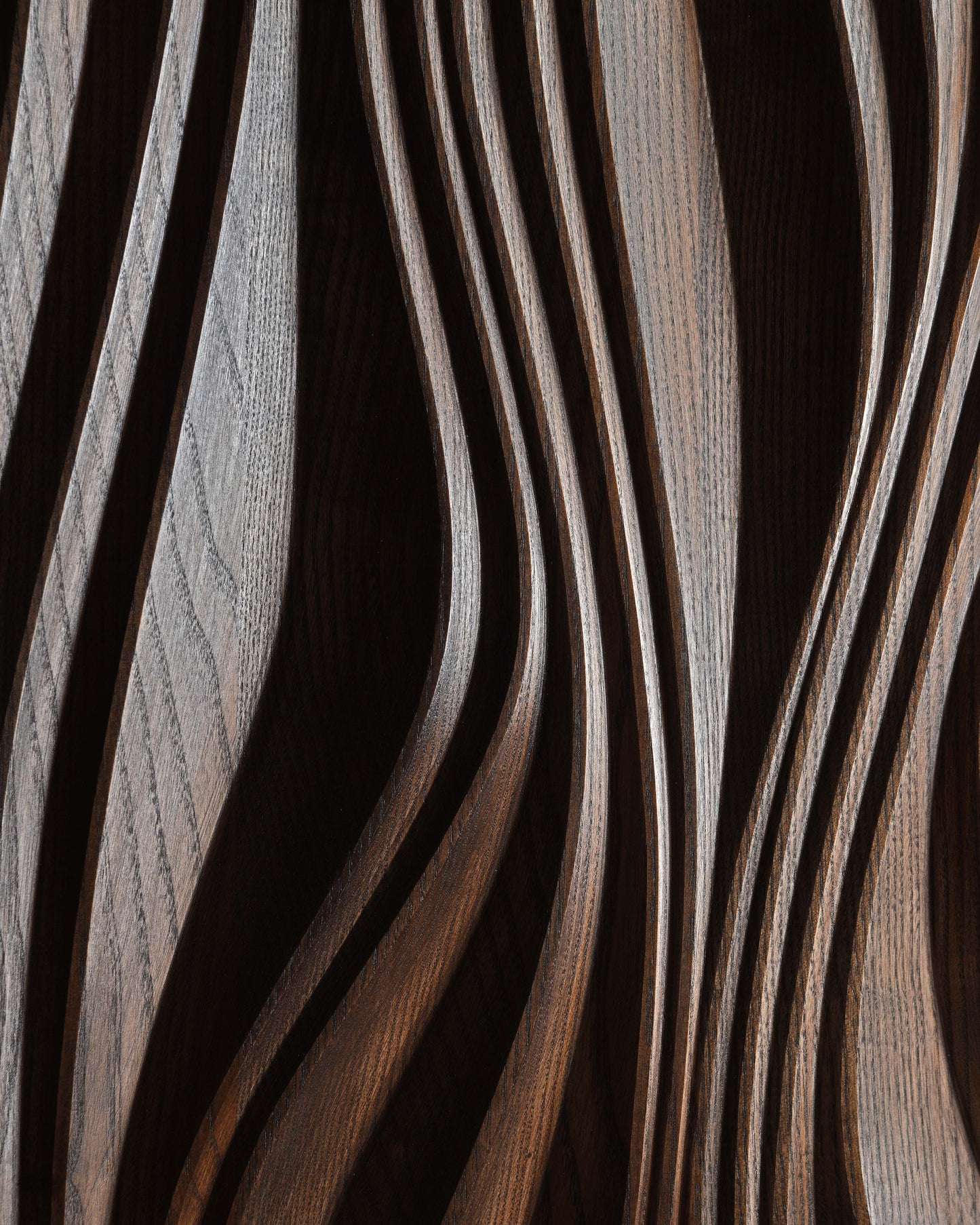 Macro detail of brown carved relief lines and shadows, texture close up