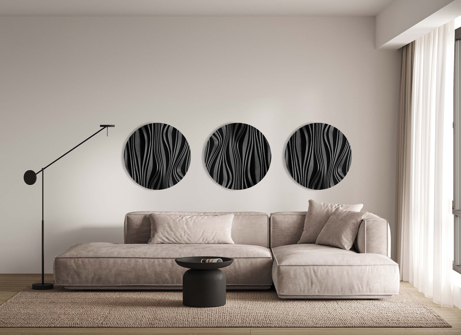 Three Forest black round sculptures installed above a sofa, interior view