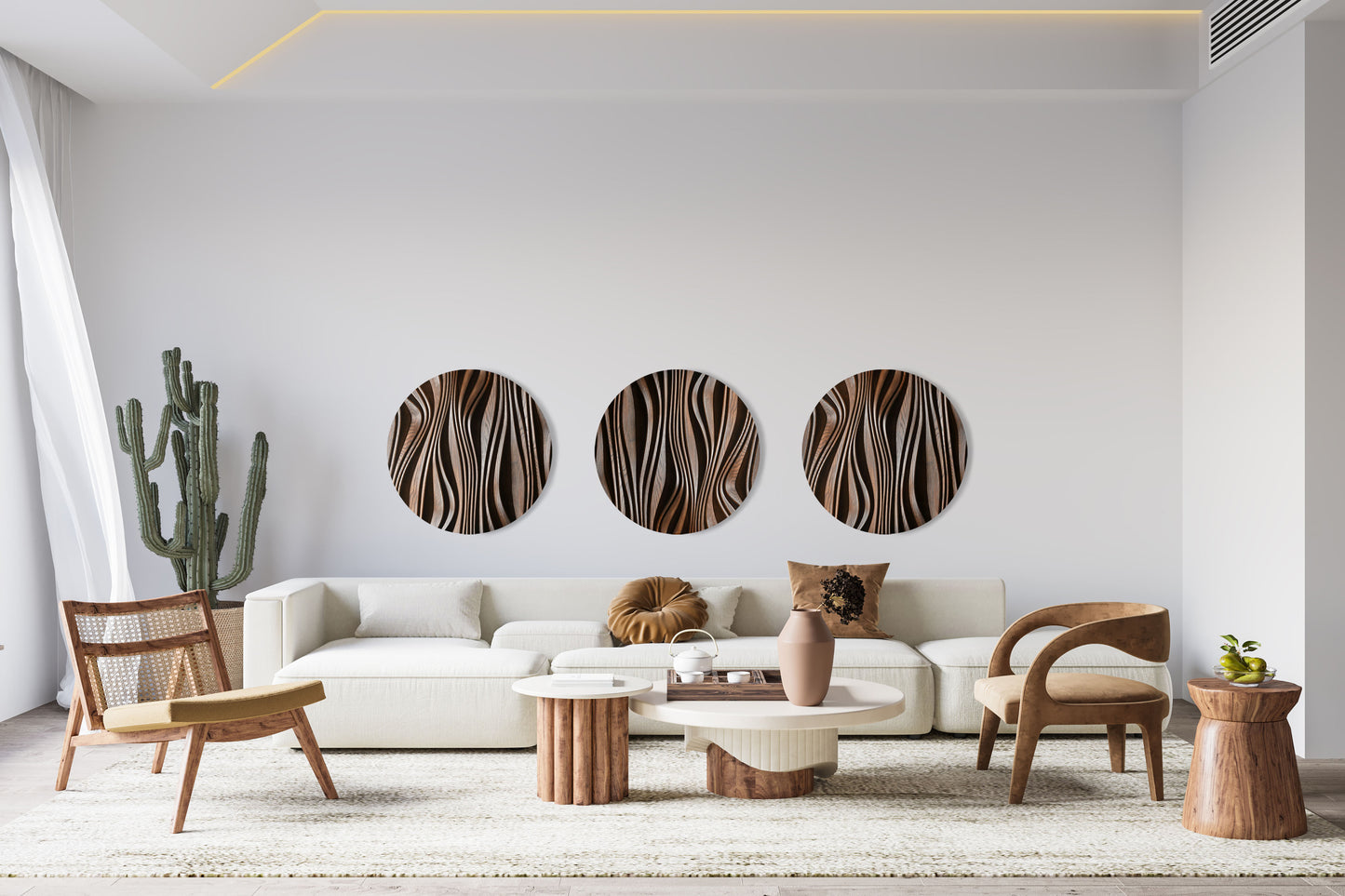 Three Forest brown round sculptures installed above a sofa, interior view