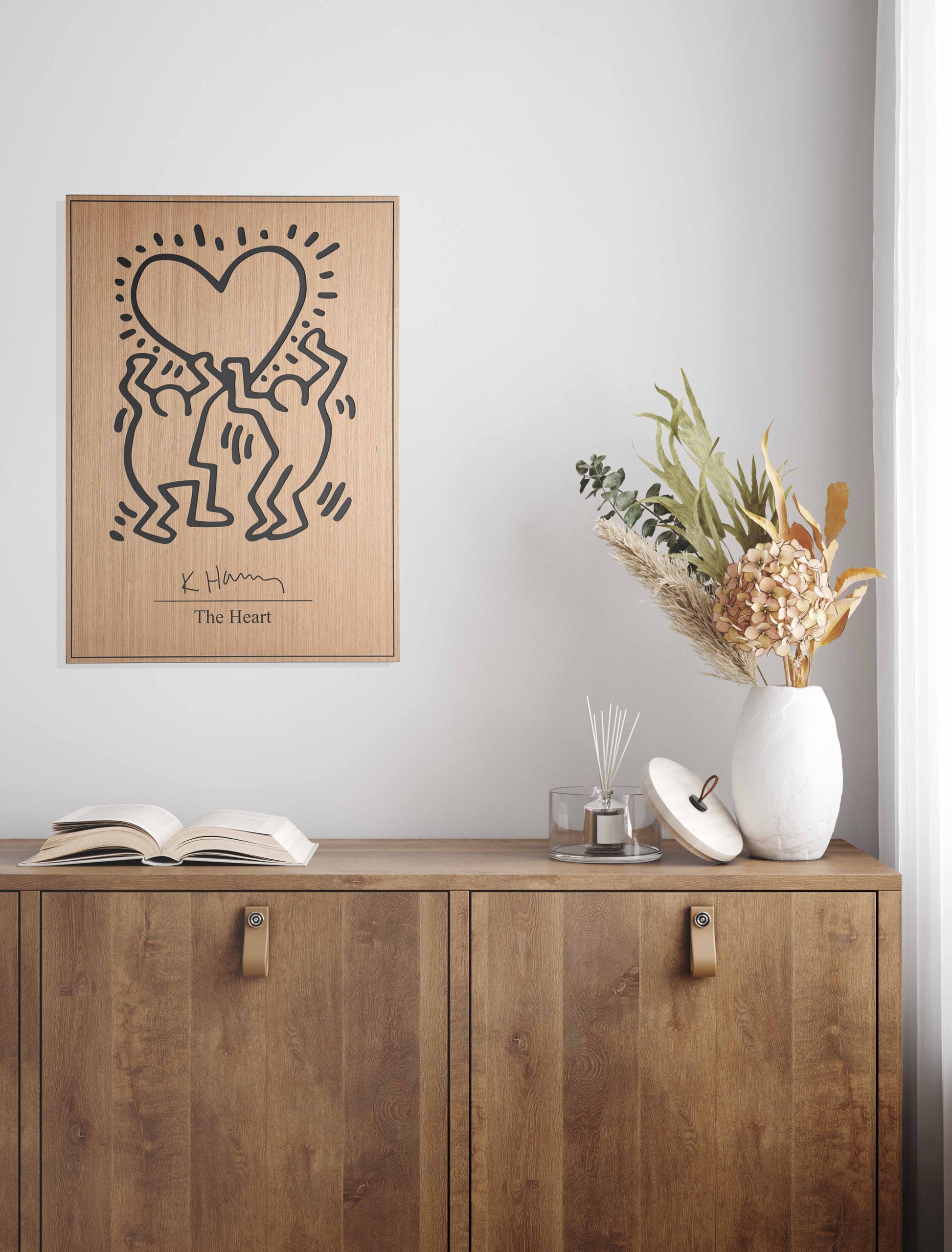 Stylish home office featuring a Kate Harring ‘The Heart’ wood panel, seamlessly uniting minimalist furniture and big wall decor elements.