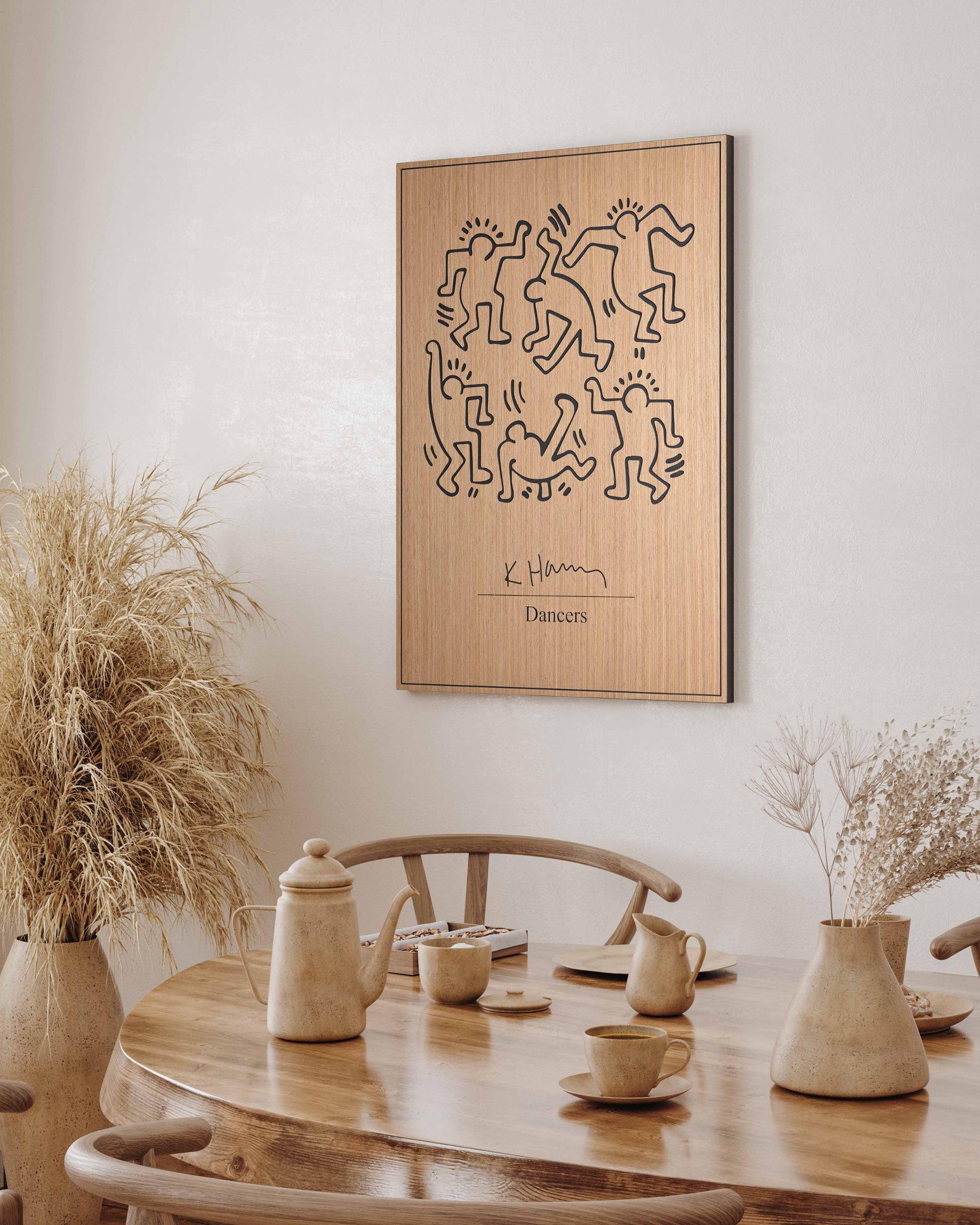 A light-filled hallway showcasing an oak-and-black carved panel with dancing figures, creating a unique focal point on a blank wall.