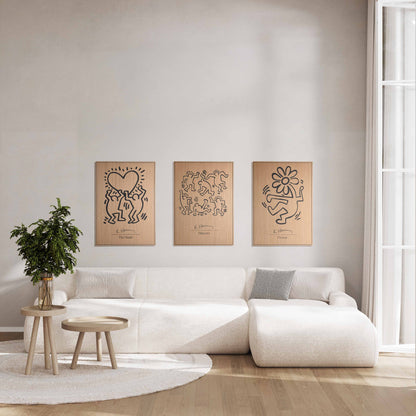 Three panel wall set featuring The Heart motif, oak and black panels above sofa