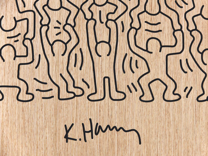 Close up of the crowd panel with signature detail carved on oak