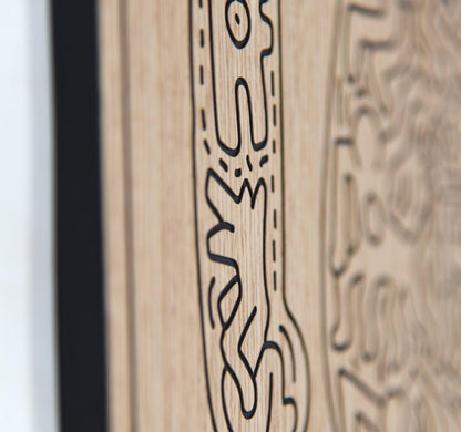 Close up of carved line detail on the dancer panel with oak grain in focus