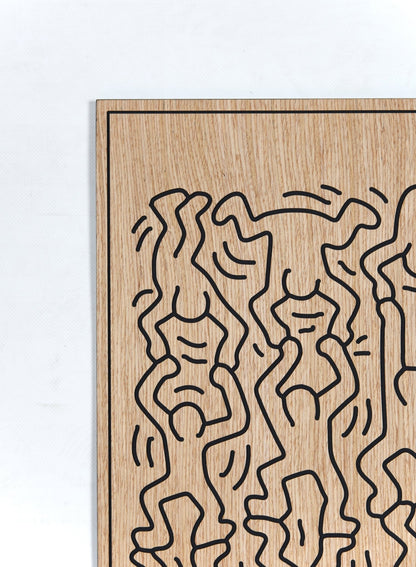 Detail of the carved figures and black relief lines on the Little Men oak wall art