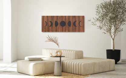 Moon lunar phases wall panel in rosewood in bright interior, full wall view