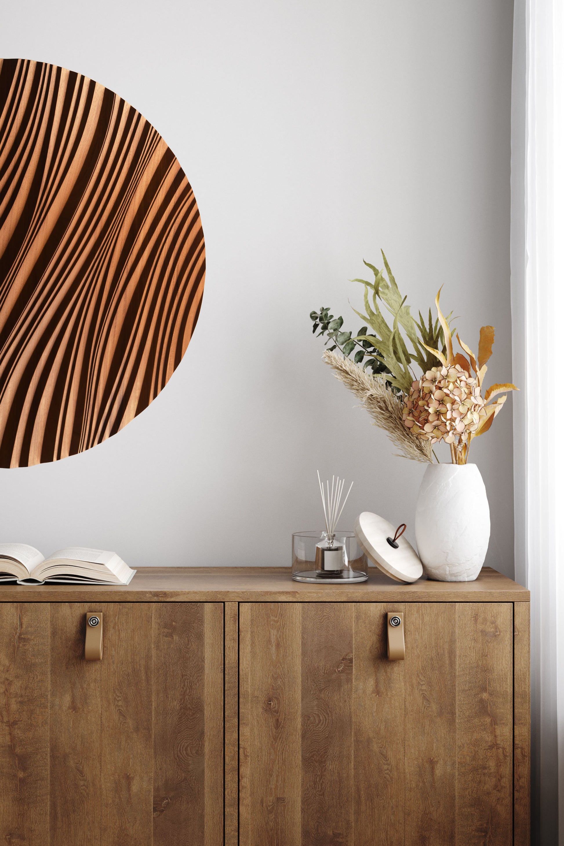 Bathe in style with a carved iroko circle featuring an erosion motif, uniting bathroom design refinement and interior decoration flair.
