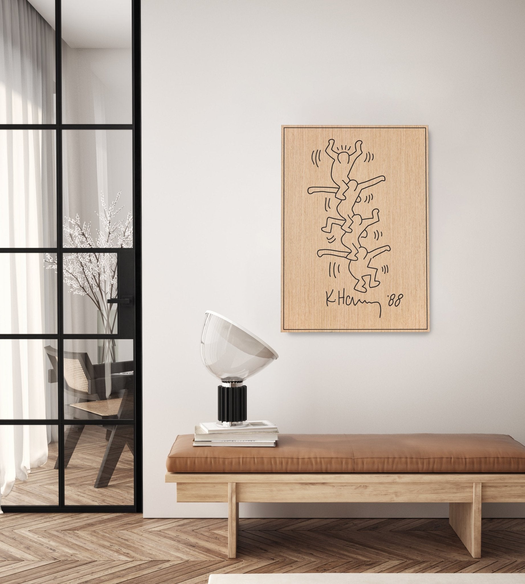 Stunts Keith Haring carved wood wall panel displayed above a bench in a modern interior