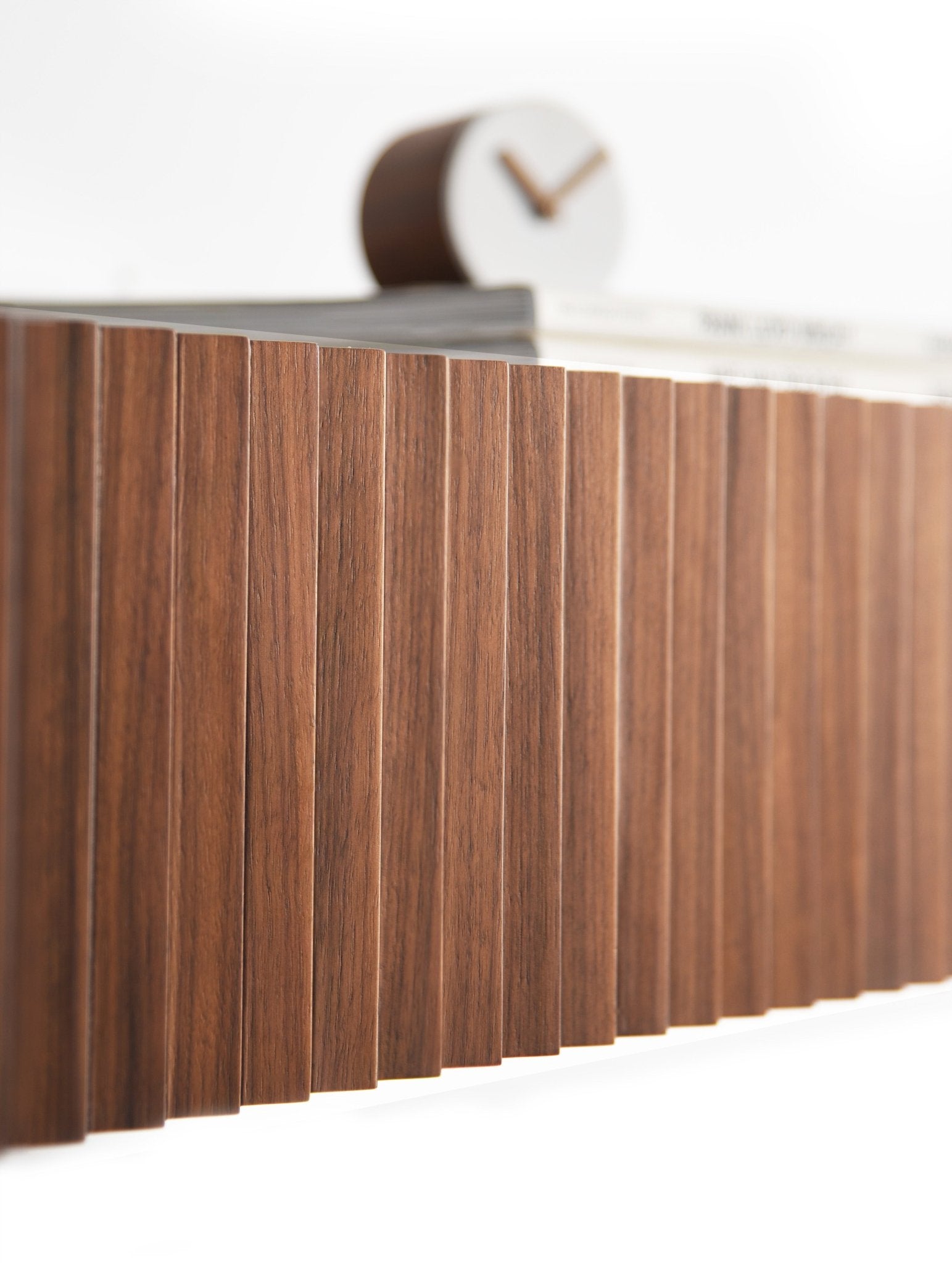 Close up of the walnut front grooves showing grain and vertical rhythm