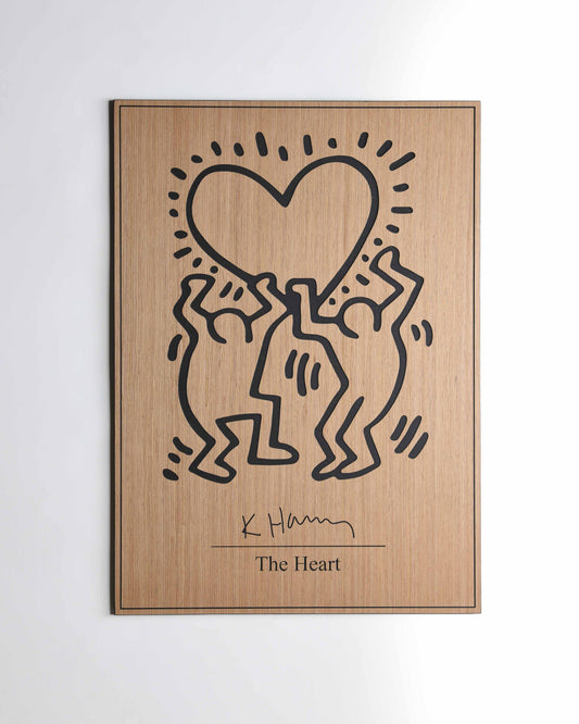 Close up of The Heart Keith Haring oak and black carved lines, relief detail