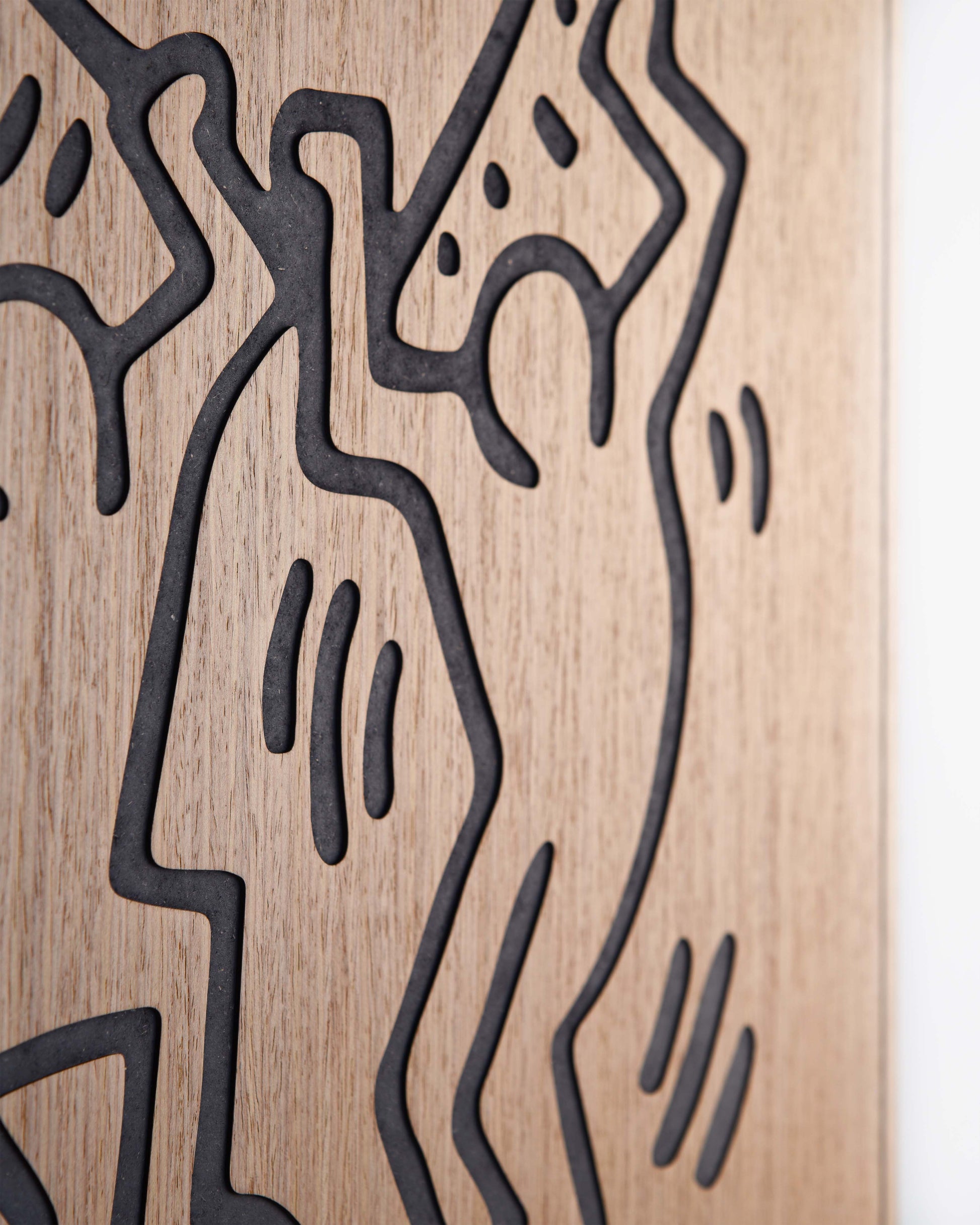 Macro detail of carved black line relief on oak wood, texture close up
