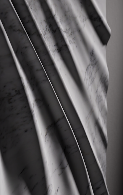 Macro view of draped folds carved in Carrara marble with subtle natural veining