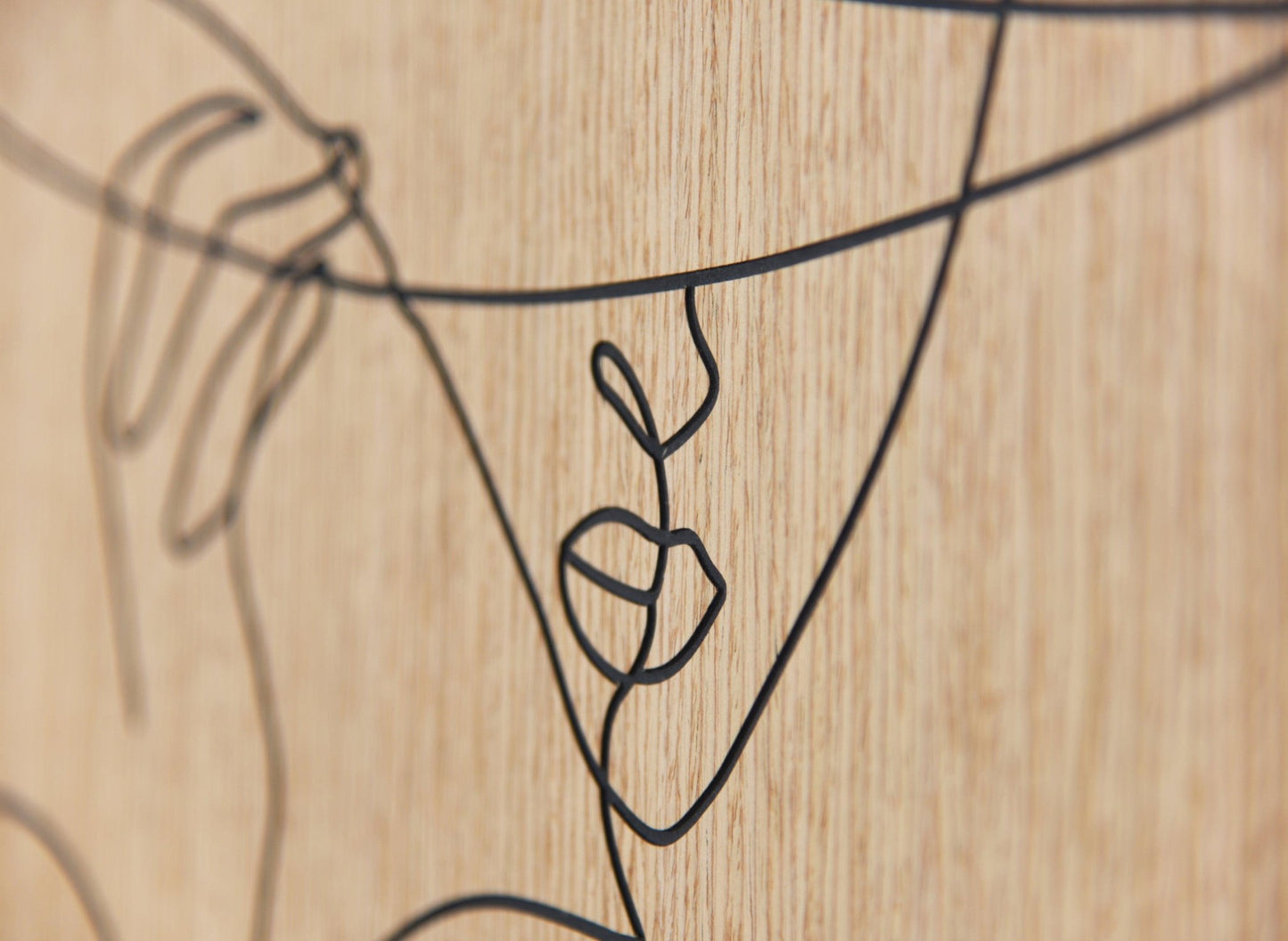 Minimal line portrait carved on oak, Woman with Hat wall art styled in a bright interior
